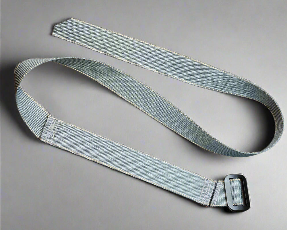 Old Machine Craft (OMC) gray Advanced AIWB CCW belt for appendix carry flat on table.