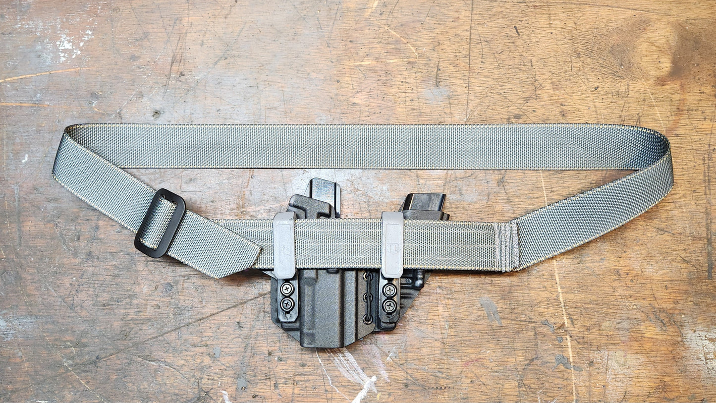 Gray Advanced AIWB CCW belt for appendix carry for appendix carry with holster.