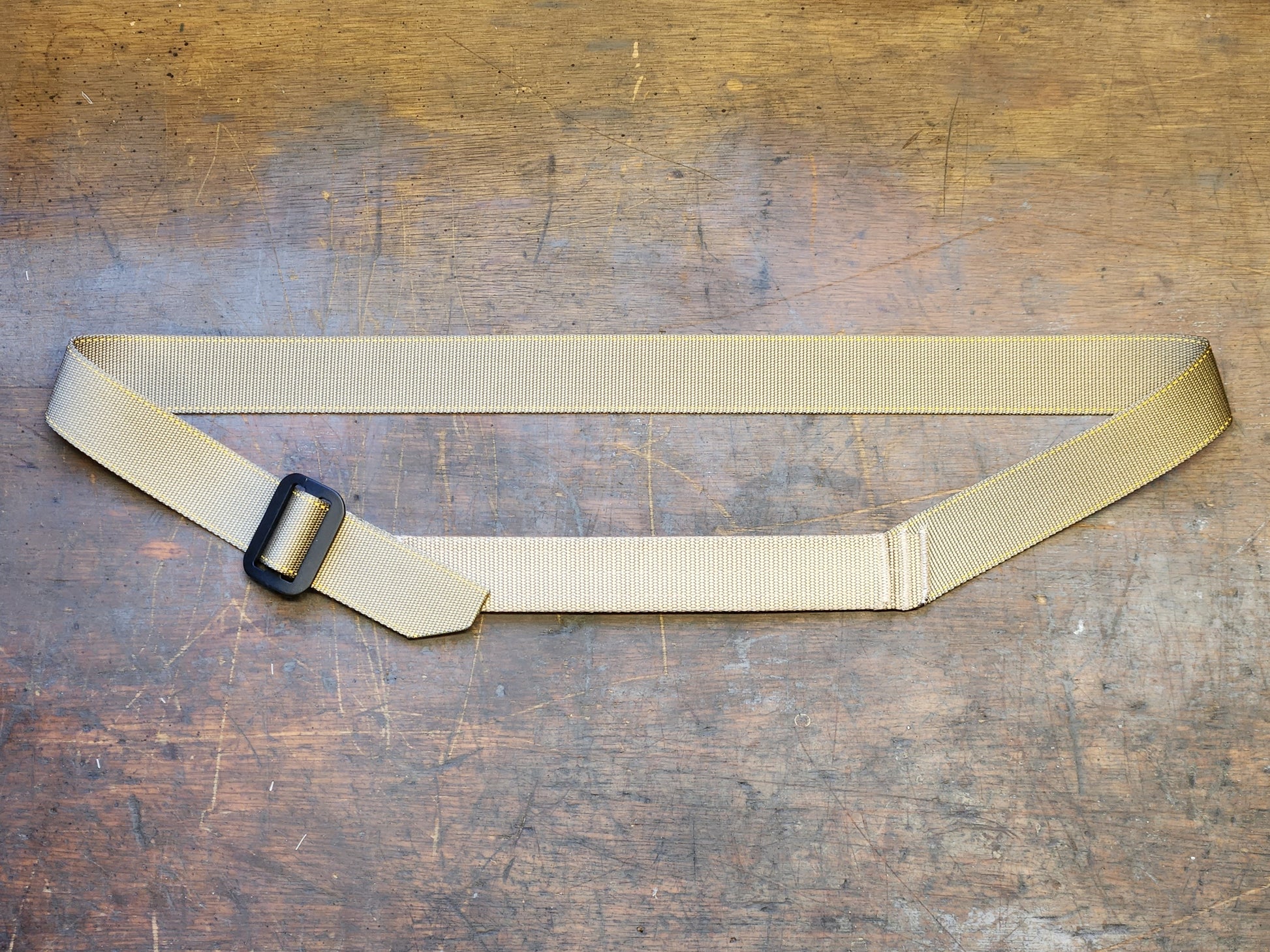 Tan advanced AIWB CCW belt on table